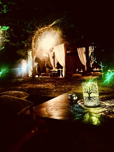 Candlelit garden lantern at Dar Mansour at night